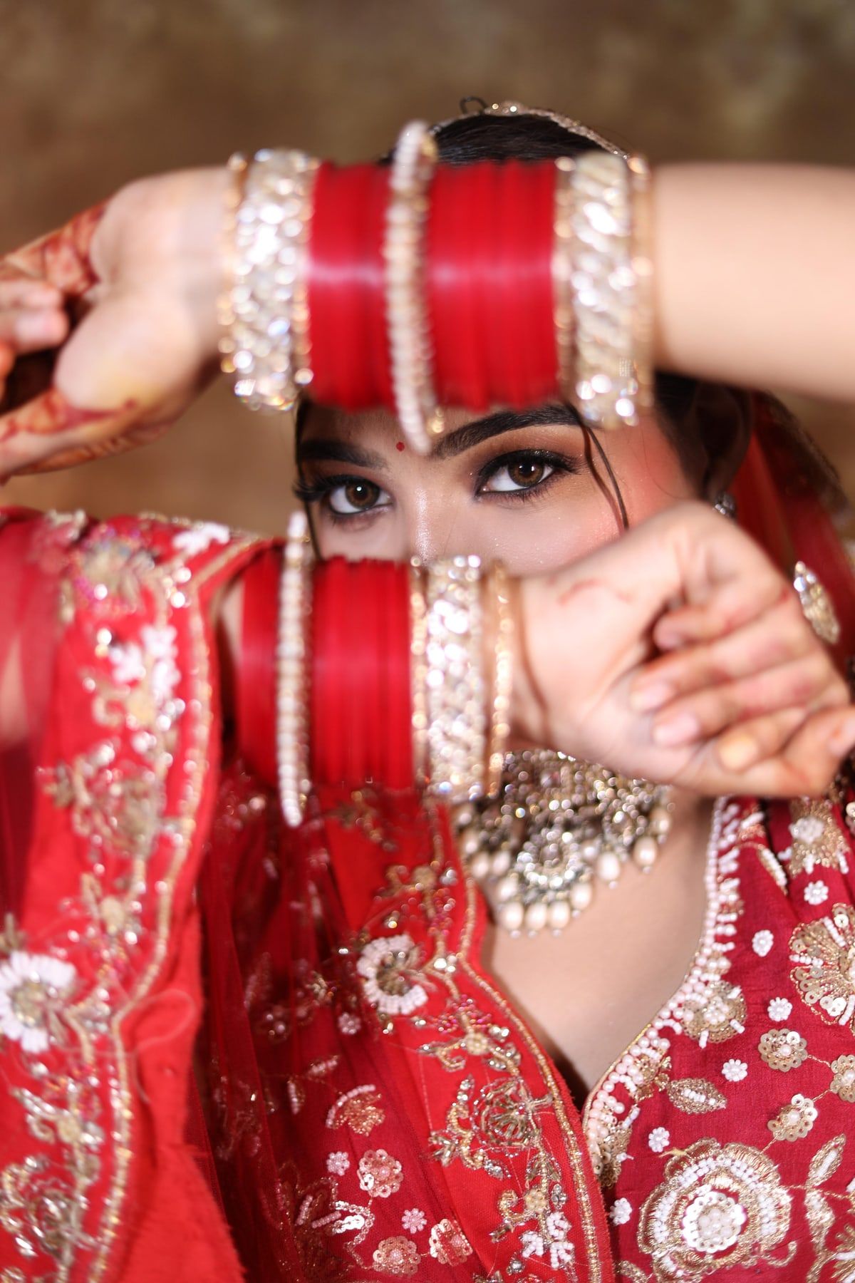 Bridal chooda and kaleere detail with lehenga