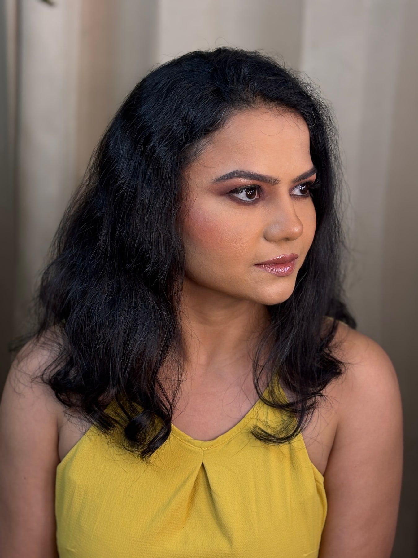 Party makeup with soft open waves hairstyling