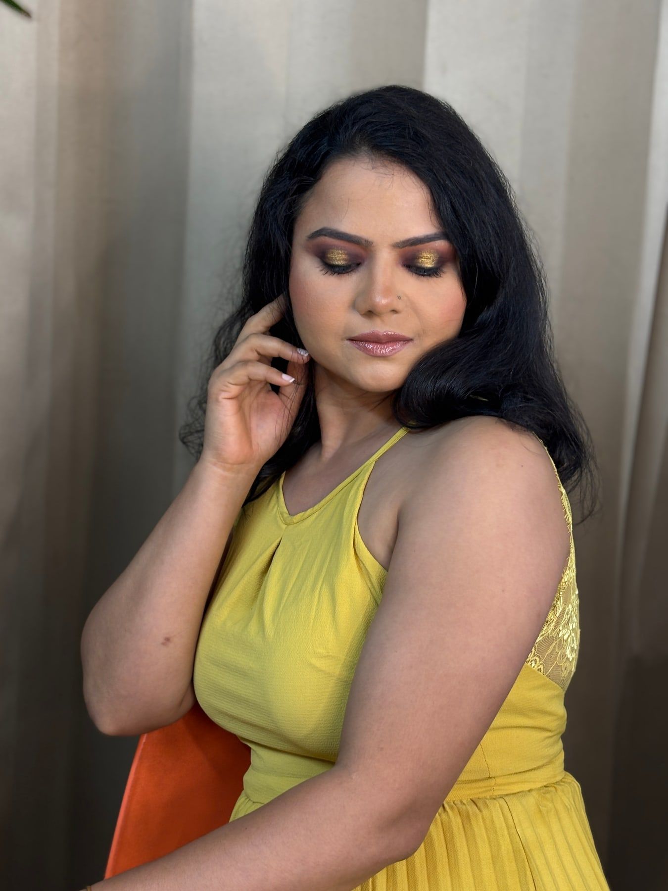 Party makeup look with sculpted cheeks and long-wear base